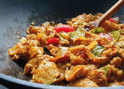 Rezeptfoto Gemüse wird im Calido Wok scharf angebraten
