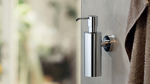 Soap dispenser with wall mounting: Soap dispenser Brass by kela